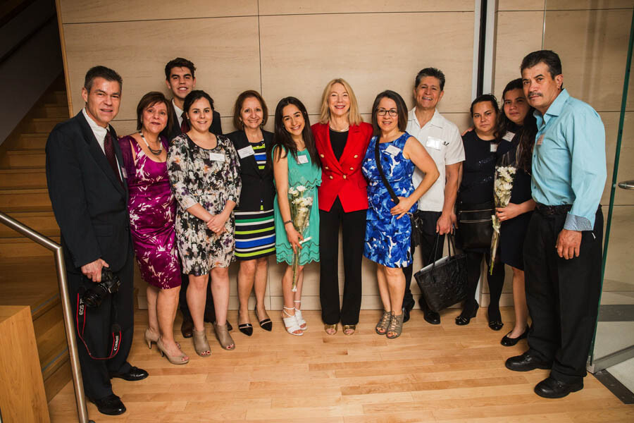 President Gutmann poses with Innovation Prize winners and their families after the annual awards luncheon