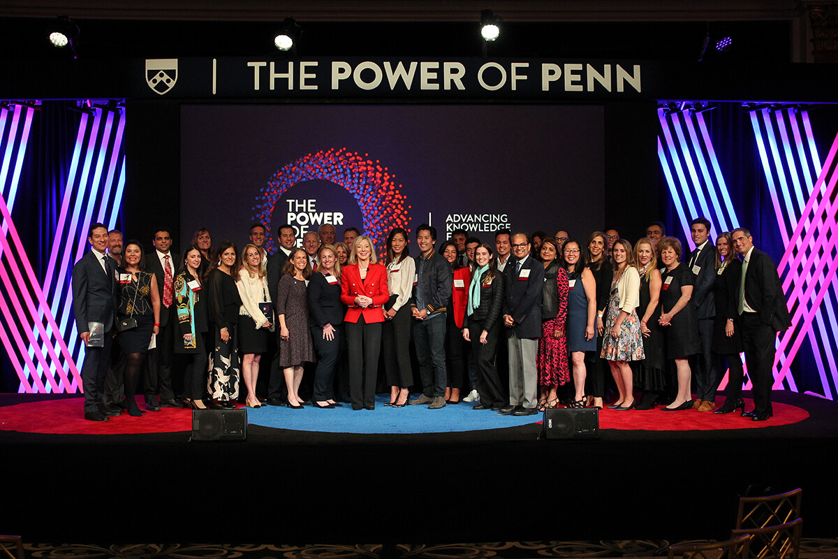 President Gutmann onstage with Power of Penn committee members during an event in LA